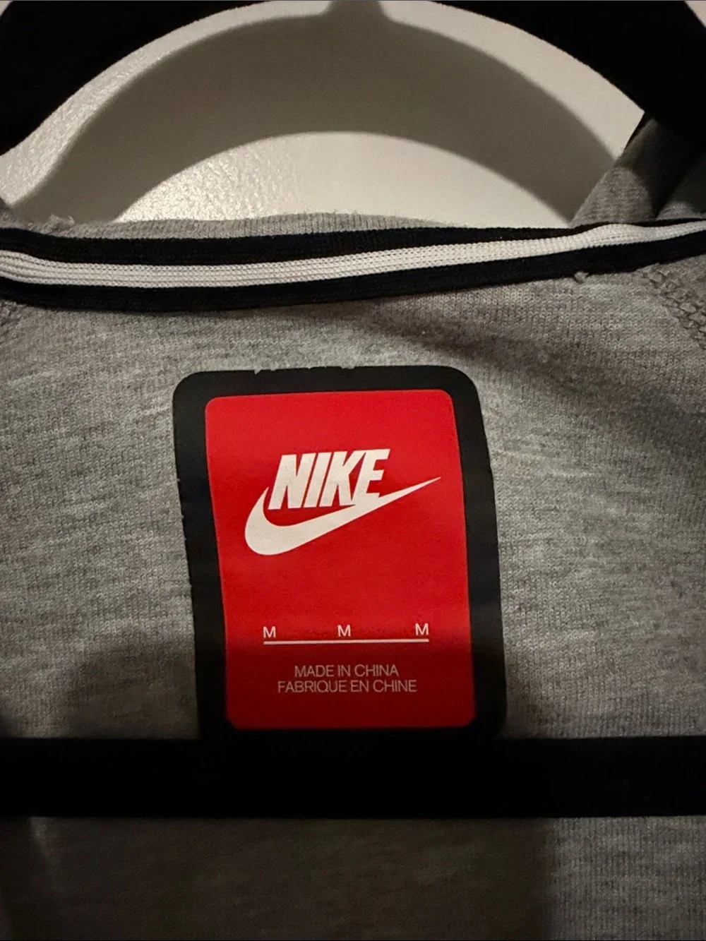 Nike Tech Fleece Grey Asymmetric Zip Bomber Jacket with Black Trim